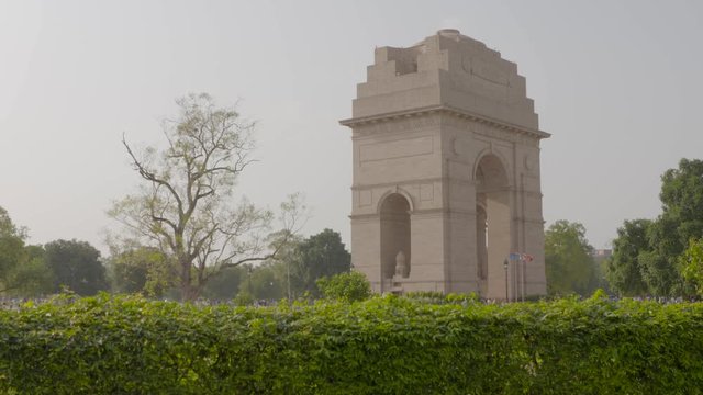 A daylight wide shot of The India Gate, originally called the All India War Memorial, located astride the Rajpath, New Delhi, India.