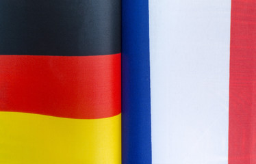 national flags of Germany and France closeup policy