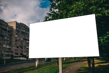 Blank mock up of street poster billboard on city background © San4ezz007