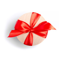 Gift box with red ribbon on white background isolation, top view