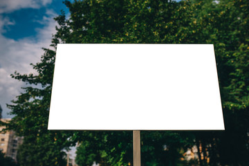 Blank mock up of street poster billboard on city background