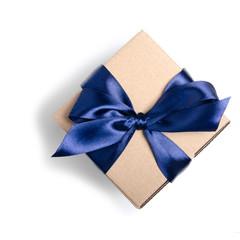 Gift box with blue ribbon on white background isolation, top view