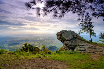 Rocky cliff in the morning on Khao Luang mountain in Ramkhamhaeng National Park