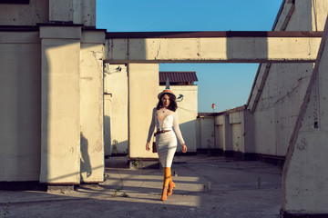 Stylish young girl in an autumn look