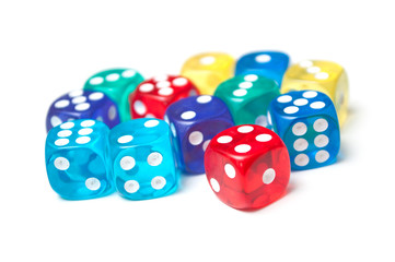Closeup of colorful dices on white background