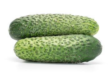 Group of two whole ripe fresh pickling cucumber isolated on white background