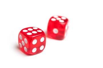 Closeup of red dice on white background