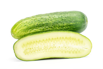 Group of one whole one half of fresh green pickling cucumber isolated on white background