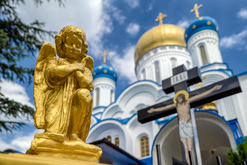 Statue of angel in front of church in ukraine