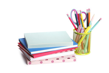 Fototapeta premium School supplies with notebooks on white background