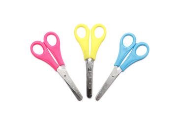 set of different color scissors isolated on a white background.