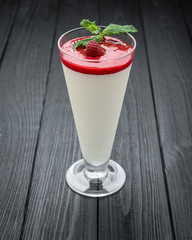 Traditional italian dessert vanilla strawberry panna cotta with fresh berries