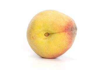 Group of two whole fresh fuzzy peach with blush isolated on white background