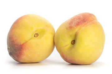 Group of three whole bright fresh fuzzy peach isolated on white background