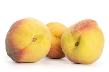Group of three whole bright fresh fuzzy peach isolated on white background