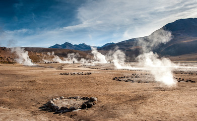 El Tatio, Atacama, Chile. Active geysers comes out of the ground. Hot vapor erupting activity,...