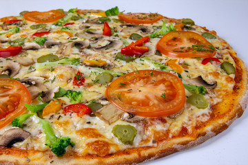 Vegetarian pizza closeup background with mushrooms, bell pepper, gherkin and tomatoes