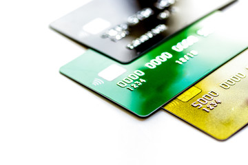 pile of credit cards on white background