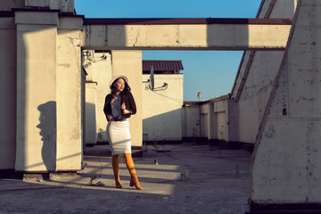 Stylish young girl in an autumn look