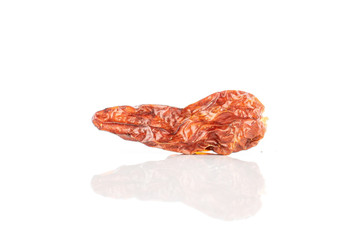 One whole hot dry red chili pepper peperoncino isolated on white background