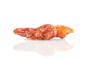Group of two whole dry red chili pepper peperoncino isolated on white background