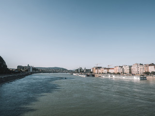Fototapeta premium A beautiful panoramic view over the Danube and the houses of Budapest.