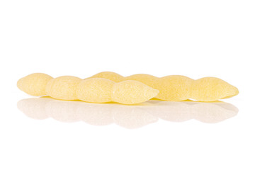 Group of two whole uncooked pasta cavatelli in row isolated on white background