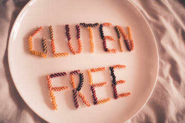 Gluten free pasta on white plate closeup. Healthy lifestyle concept. Selective focus.