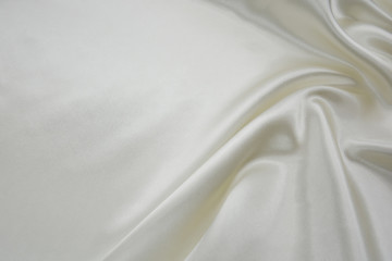 Delicate satin draped fabric white texture for festive backgrounds