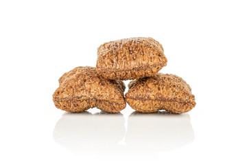 Group of three whole crispy brown cereal pillow isolated on white background