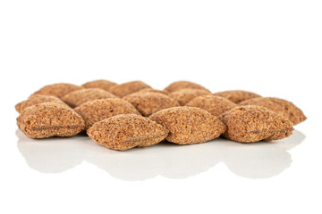 Lot of whole crispy brown cereal pillow in one group isolated on white background