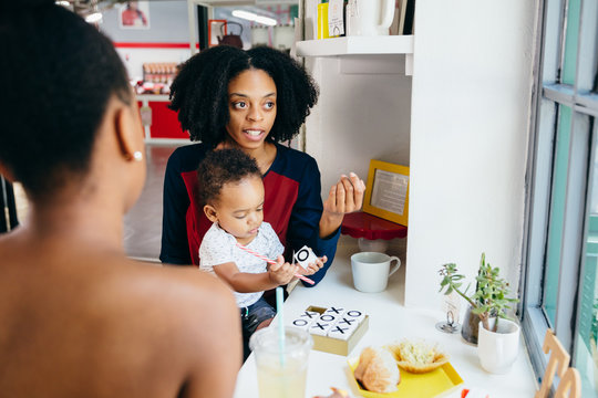 Mother and son at tea shop