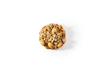 Sweet cookies, natural nuts and caramel. On a white background isolate. A treat for any holiday.