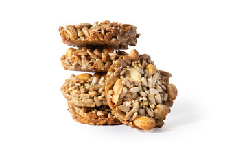 Sweet cookies, natural nuts and caramel. On a white background isolate. A treat for any holiday.