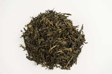 Sencha green tea on a white background