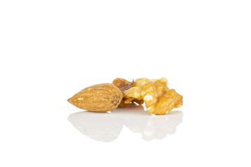 Lot of whole front focus brown almond nut isolated on white background