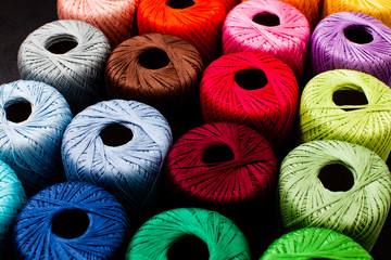 Colored balls of yarn for knitting close up
