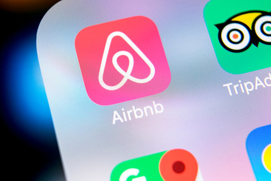 Sankt-Petersburg, Russia, March 7, 2018: Airbnb application icon on Apple iPhone X screen close-up. Airbnb app icon. Airbnb.com is online website for booking rooms. social media network.