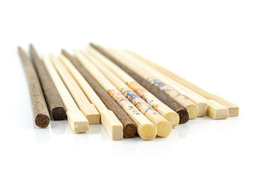 Lot of whole colorful asian brown chopsticks isolated on white background