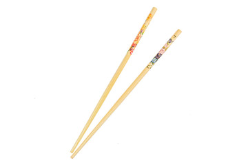 Group of two whole asian brown chopsticks flatlay isolated on white background