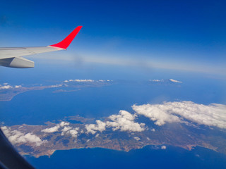 view from the plane to the coastline