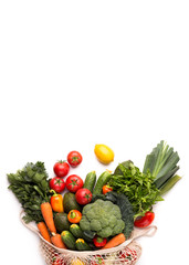 Reusable shopping bag full of fresh and organic vegetables