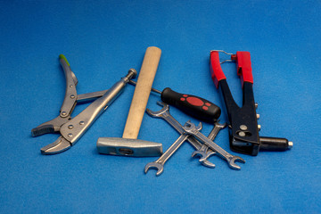 hand tool on a blue background
