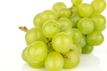 Lot of whole fresh green grape closeup isolated on white background