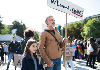 People with placards and posters on global strike for climate change.