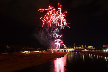 Fireworks over the skyline of Dresden in the night