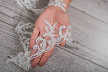 texture, background, pattern. white lace fabric. This wonderful lace is perfect for your design, wedding jewelry, This lace has a beautiful rich texture and feels to it.