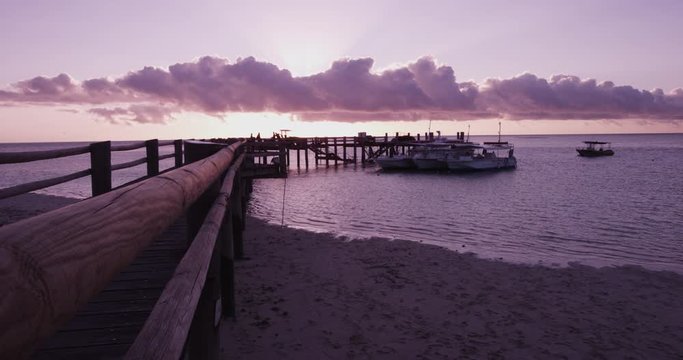 Sunset over Heron Island pier, wide