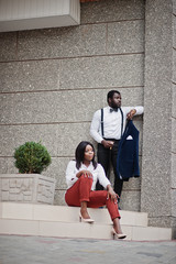 Stylish african american couple in formal wear. Romantic couple in love dating.