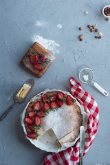 strawberry pie on white rustic background